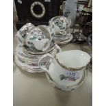 A selection of indian tree tea cups and saucers