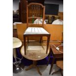 A stripped 19th Century pedestal table and an Edwardian bedroom chair