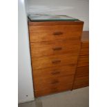 A vintage teak bedroom chest of six drawers