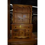 A vintage pine specimen or dolls dresser