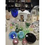 A selection of fine clear cut and colour glass wares including enamel decorated and glass set