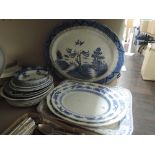 A selection of blue and white wear ceramics including chargers