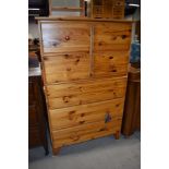 A modern pine two over two over three drawer chest