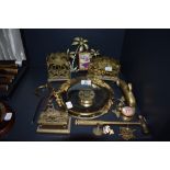 A selection of brass ware including 50 year calendar, port hole mirror etc