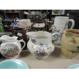 A selection of cream and water jugs