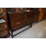 An early 20th Century oak sideboard