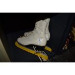 A pair of vintage ice skates