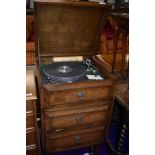 An oak hifi cabinet with vintage Garrard 401 record deck, Technics tuner amp and cassette deck