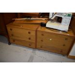 Two similar laminate low bedroom chest