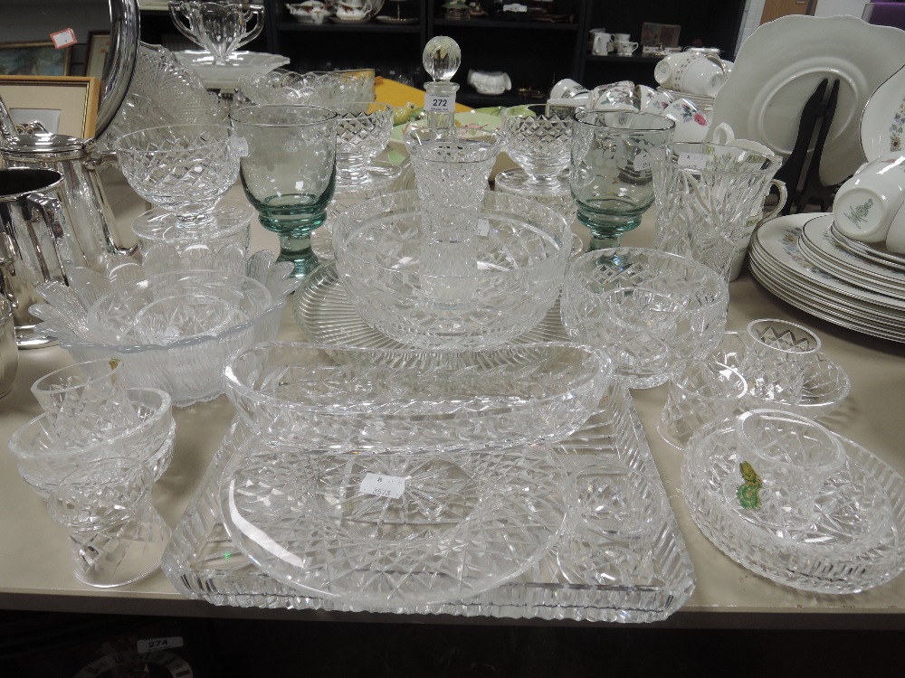 A collection of glasses , vases, bowls and more, including Waterford.