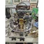 A fine selection of pewter wares and silver plated repousse spirit kettle and stand