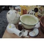 A selection of vintage medical supplies including enamel bowl and kidney dish