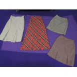 Four vintage 60s and 70s skirts, good condition, a couple of nibbles to one,various styles and