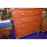 A Victorian stained pine chest of two over three drawers