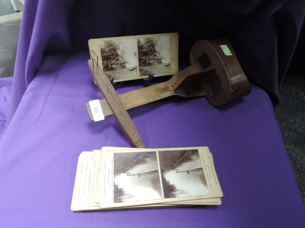 A stereoscope un named and a selection of cards by D J Johnson