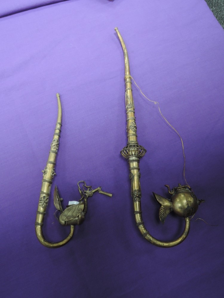 Two Indian opium pipes or similar tobacco pipes with fish and peacock imagery