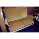 A vintage Parker Knoll settee