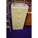 A vintage formica top narrow chest of 5 drawers
