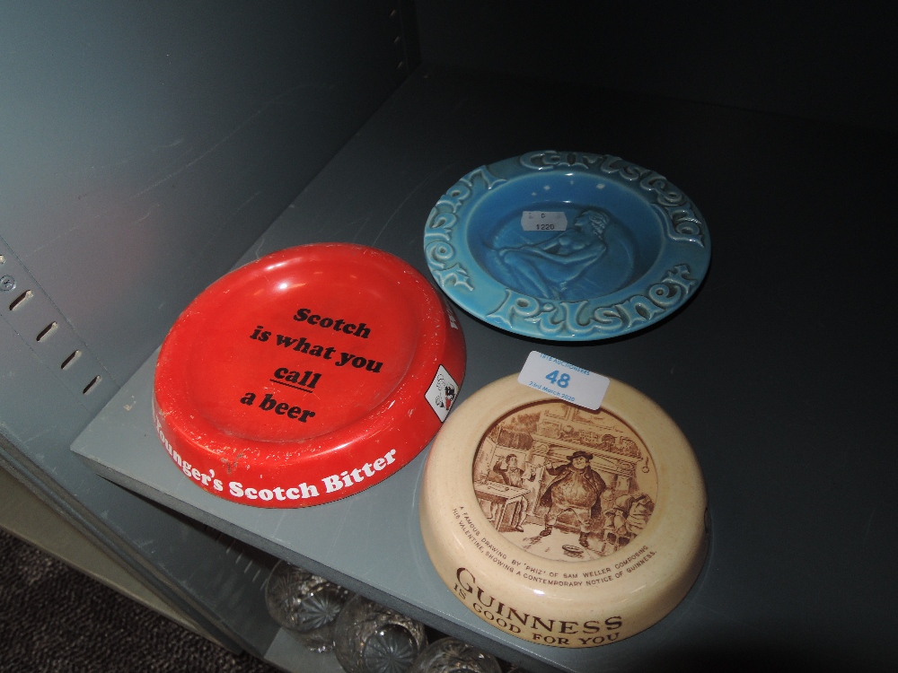 A selection of advertising smokers ashtrays including Guiness