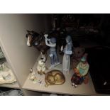 A selection of figures and figurines including shire horse