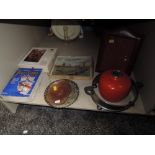 A selection of vintage jigsaws, copper ashtrays, metal ware and misc items.