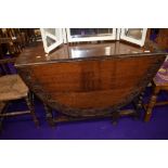 An early to mid 20th Century oak gateleg table