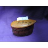 A box wood scrimshaw snuff or similar container marked Warlburg with carved port and town scene