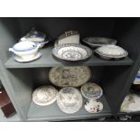 A selection of ceramics including antique transfer plates and charger