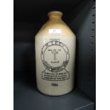 An advertising flagon for H Lees Temperance brewers