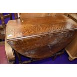 A mid to late 20th Century oak gateleg table