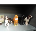 Four Beswick and Royal Doulton studies, Cocker Spaniels, black, golden brown and liver & white