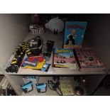 A selection of slot cars and OOR Wullie and Broons book