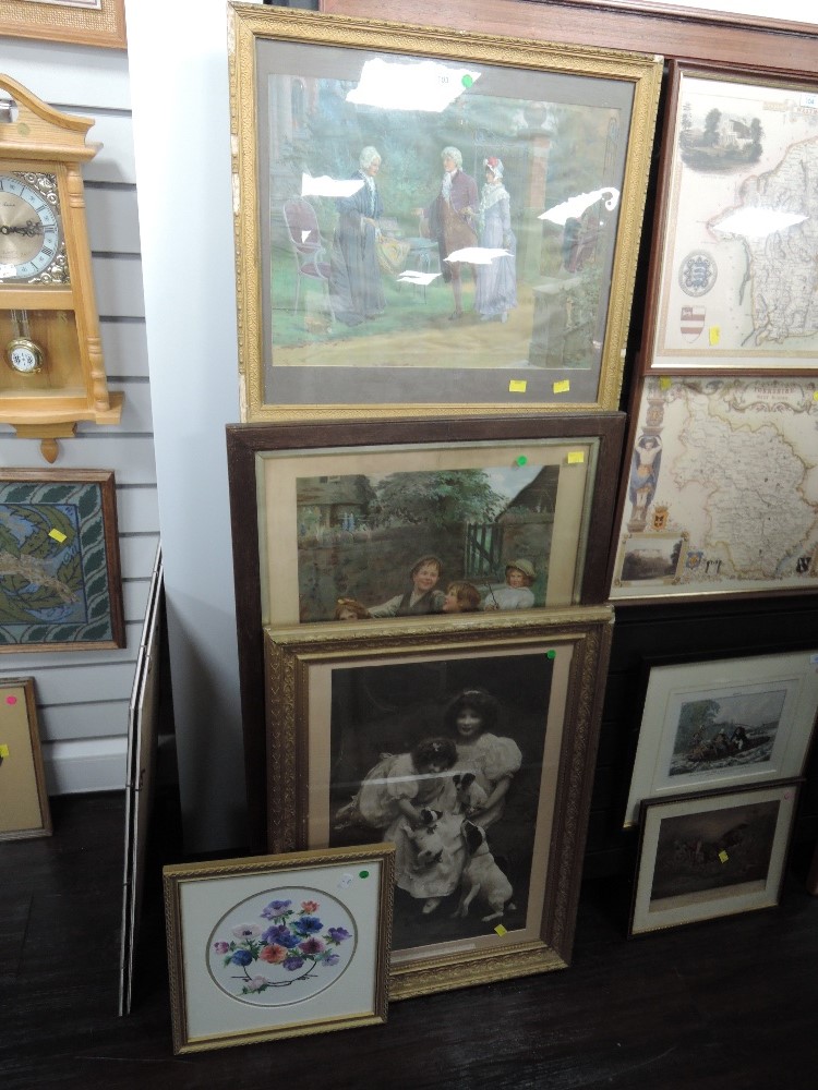 A selection of prints including needle work and gilt and plaster frame