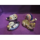 Four Royal Crown Derby paperweights, Snail having ceramic stopper, Owl having silver stopper,