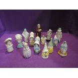 A collection of fourteen Royal Worcester candle snuffers from young girl to nun and hush