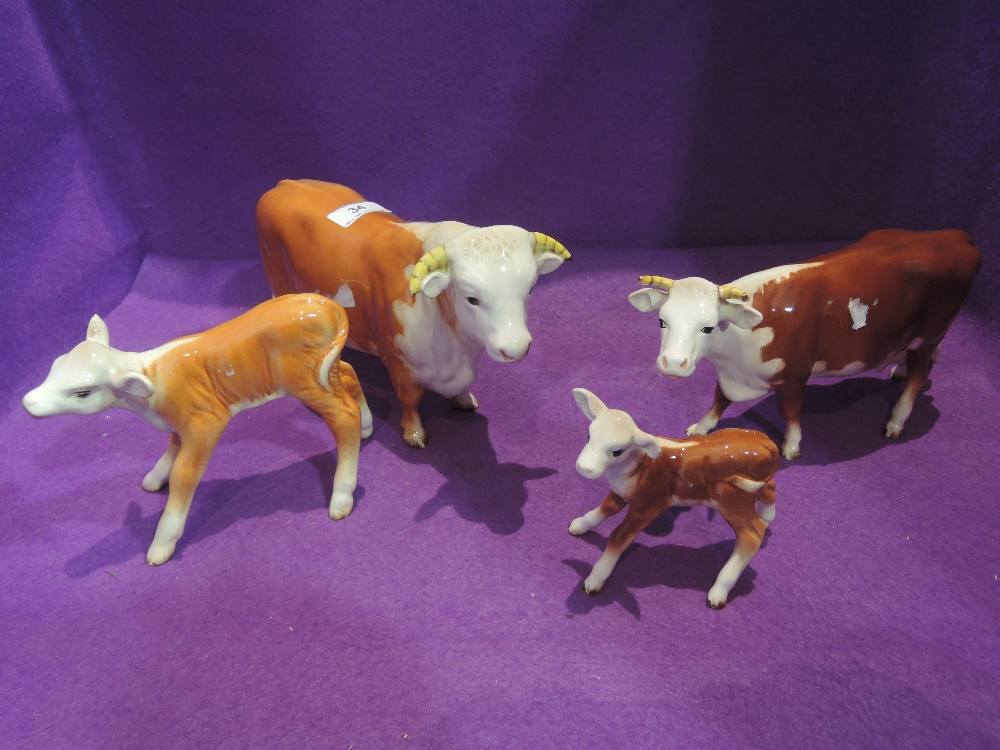 Four Beswick studies, Hereford Family, Bull 949, Cow (af) 899, Calf 854 and Calf 901B