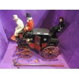 A hand made wooden four wheel carriage having Royal Mail decoration and three composition passengers