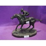 A modern spelter study, Racehorse and Jockey in running, bearing signature Mene