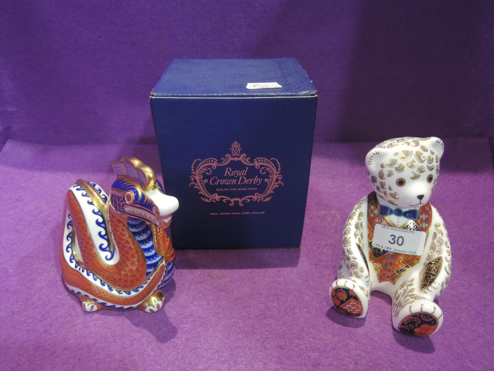 Two Royal Crown Derby Paperweights, Dragon having gold stopper, boxed and Seated Teddy Bear having