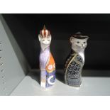 Two Royal Crown Derby Royal Cats paperweights, Pearly Queen & Abyssinian, both missing stoppers and
