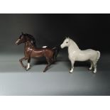 Two Beswick studies, Welsh Mountain Pony, first version 1643 and Palomino, Prancing Arab Type, brow