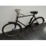 A 1930's Raleigh All Steel bicycle having sprung seat