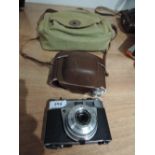 A Kodak Retinette 1A camera with canvas camera bag
