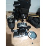 A Praktica MTL50 with Clubman zoom lens 28-200 mm, an Ilford Sportsman camera, a Cobra tripod,