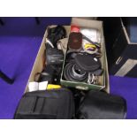 A selection of cameras and photographic equipment, including Minolta 505si Super Dynax SLR, a