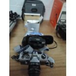 A Praktica Nova II camera, a Pentax ESPIO 928 camera, a Pentax 28-80mm lens, a Prakica 50mm lens and