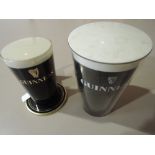 Two Guinness pint advertising bar lights