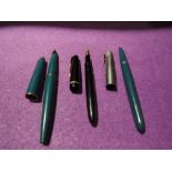 Three Parker fountain pens, a Slimfold and a 51