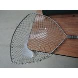 An adjustable and folding landing net