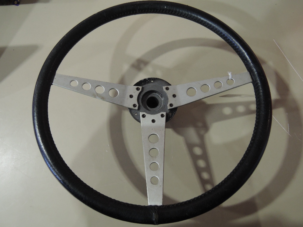 A new old stock 15'' three spoke steering wheel for Jaguar cars